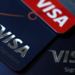 Visa credit cards are displayed